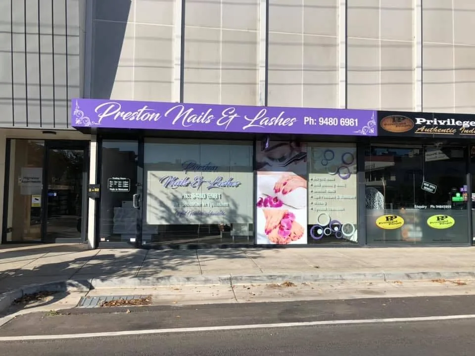 Preston Nails & Lashes shopfront on High Street — purple awning with white-script signage showing the phone number